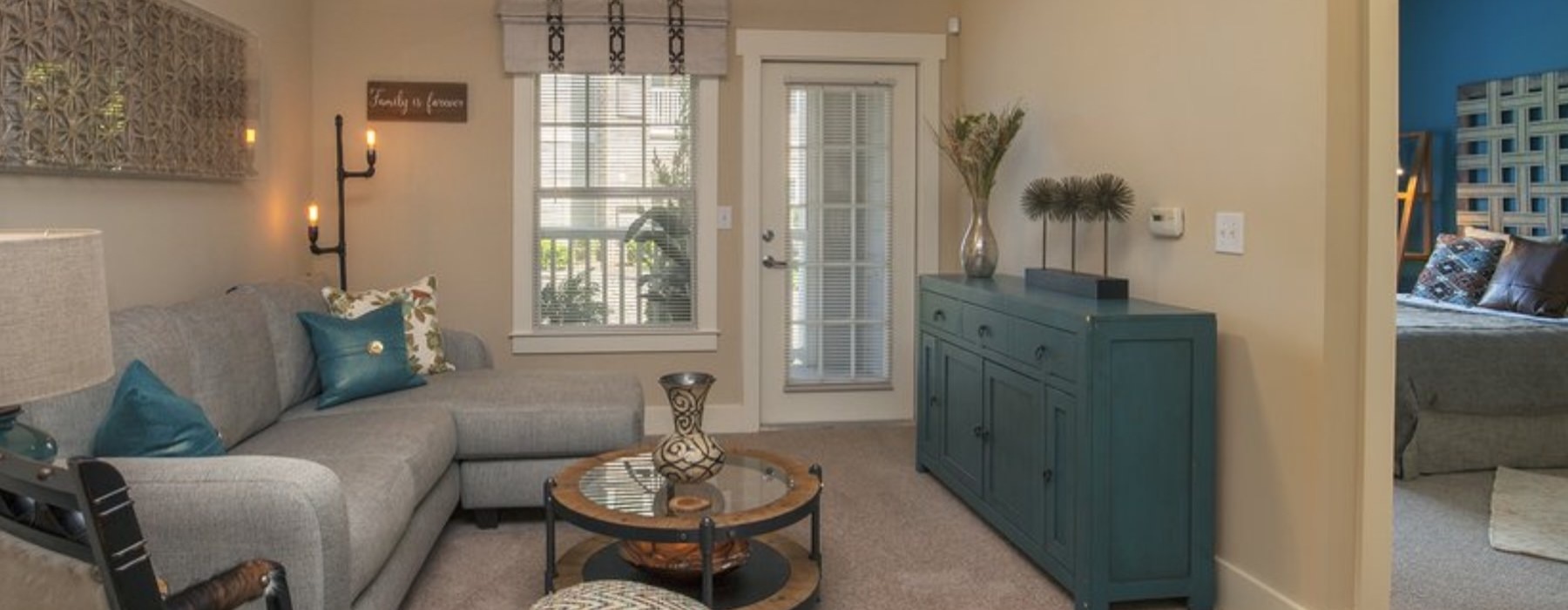 a living room with a ceiling fan