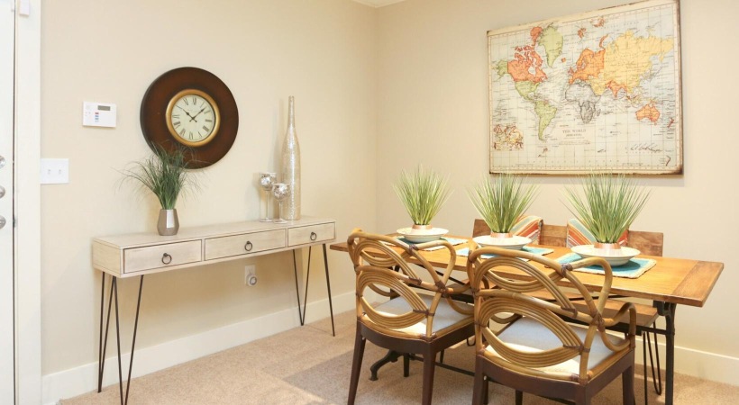 a dining room table with chairs