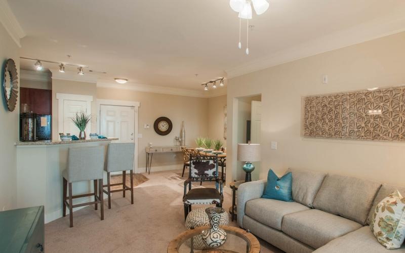 a living room with a couch and a table